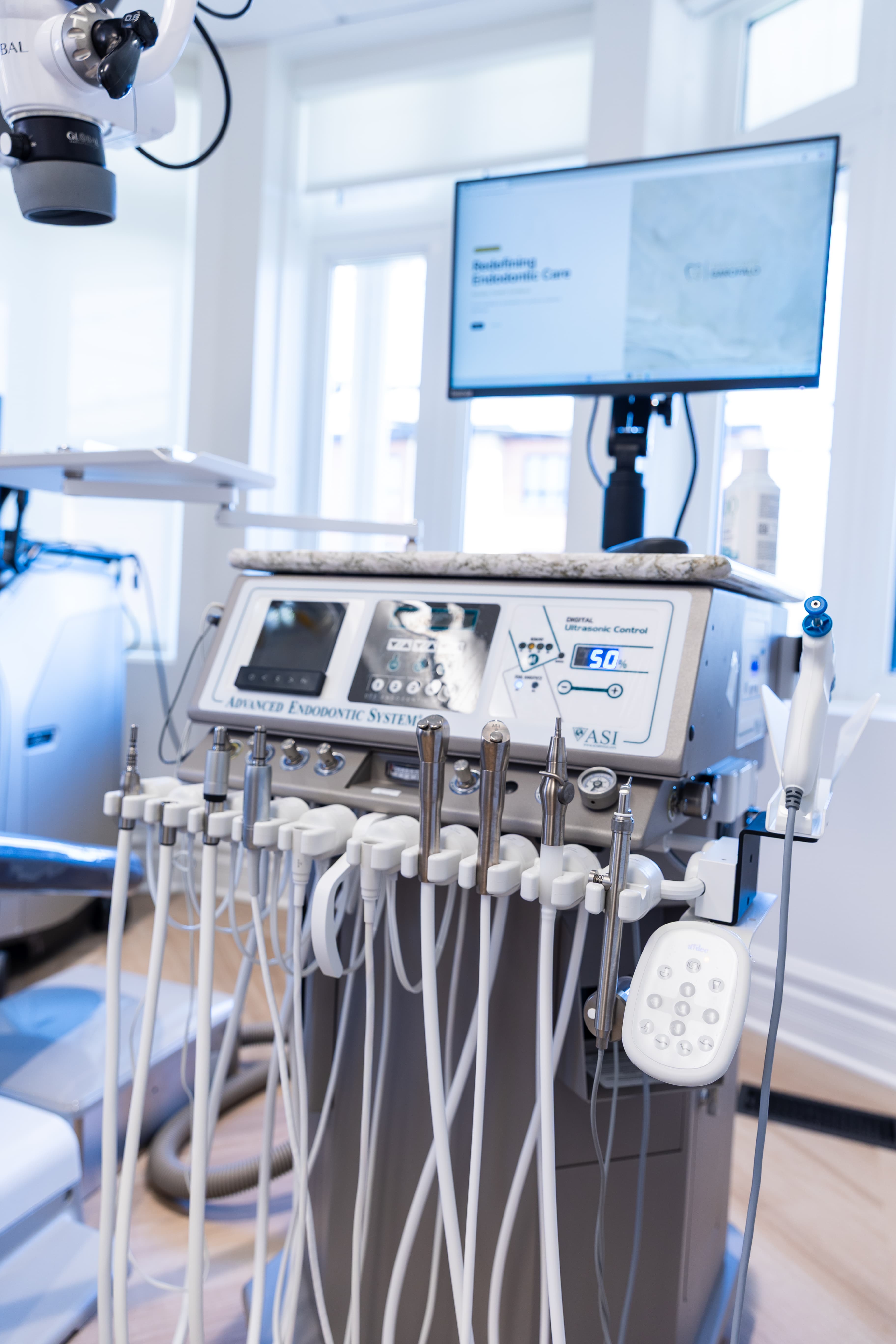 ASI Advanced Endodontic System cart with ultrasonic handpieces and Ni-Ti rotary instrumentation