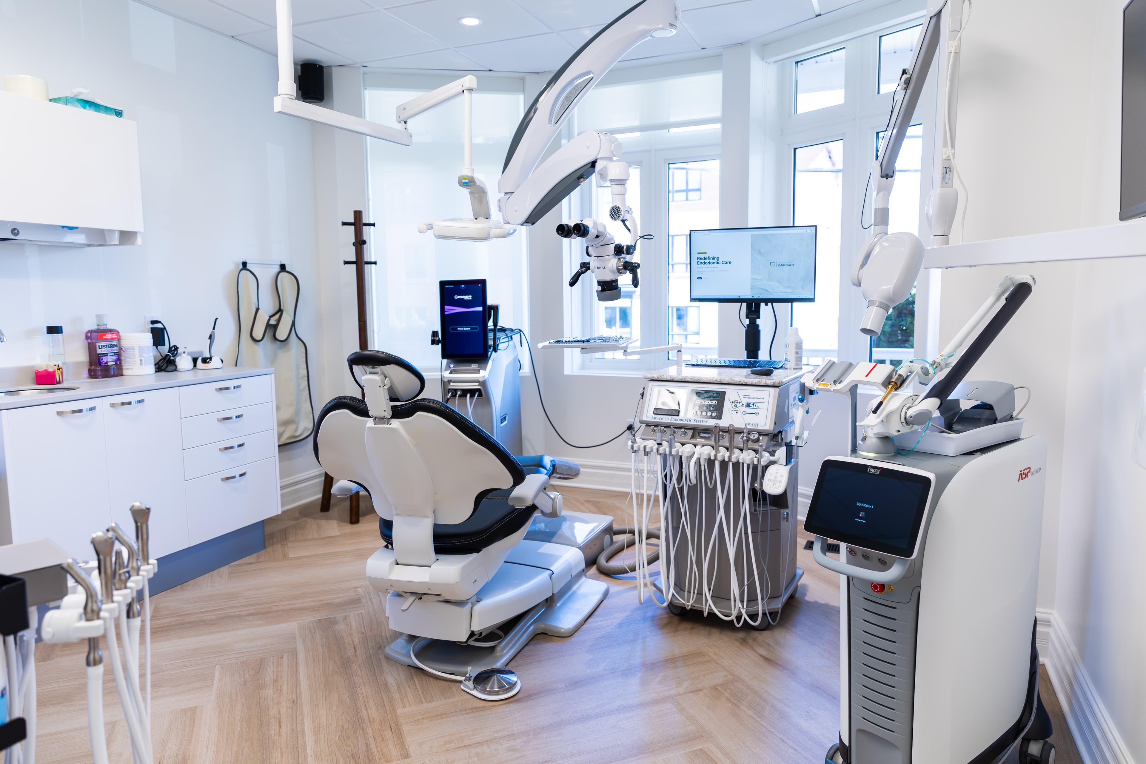 Main endodontic operatory with surgical microscope, Fotona LightWalker laser, and integrated digital treatment systems